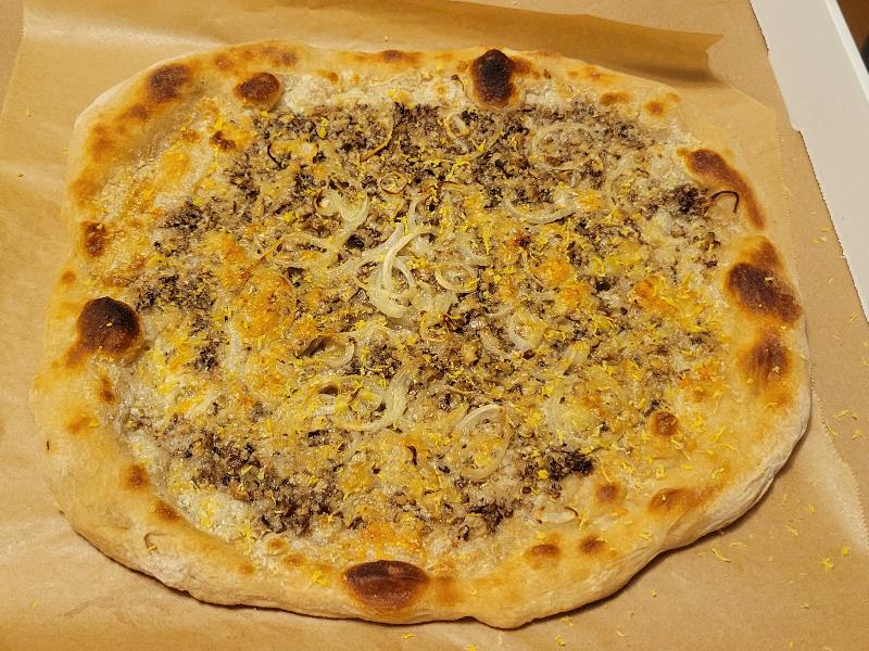 16''Crème Fraîche, Portobello, White Onion Sourdough pizza with Parmesan Reggiano and grated Lemon